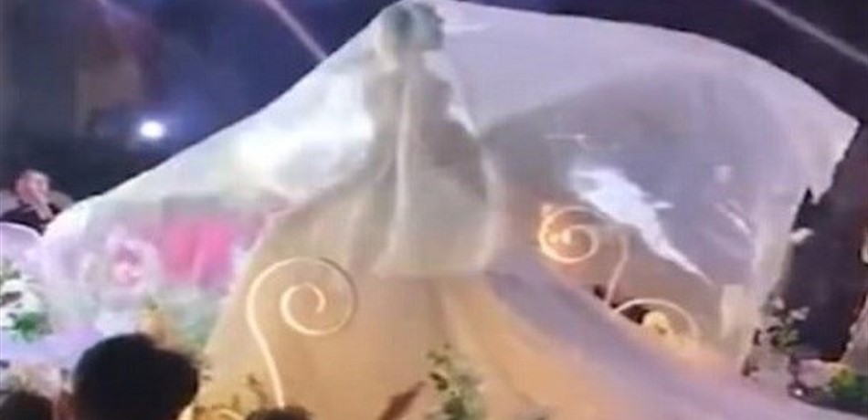 بالفيديو: غطاء رأس العروس "الطائر".. صيحة جديدة تجتاح الإنترنت