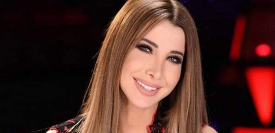 بالفيديو: نانسي عجرم تستعرض قدرات ابنتيها بالسباحة.. وهذا ما فعله زوجها