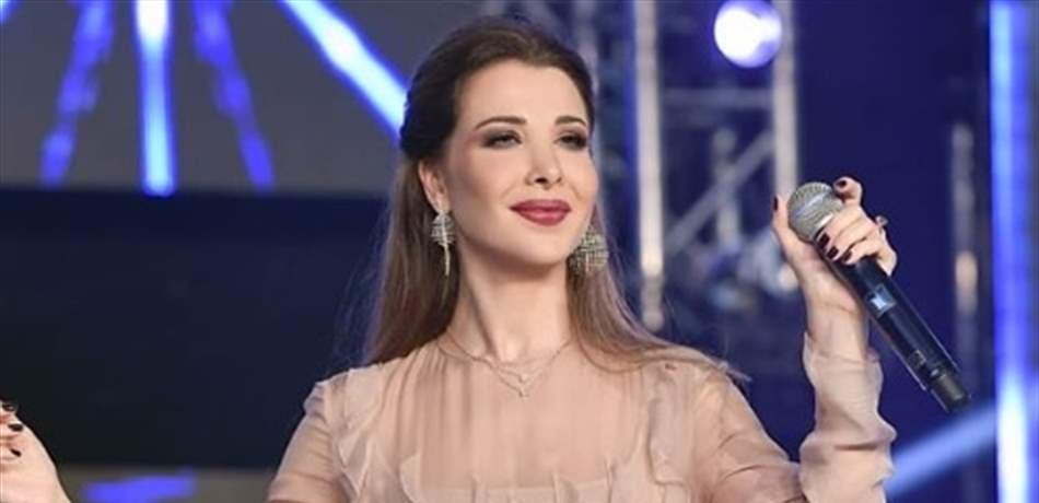 بالفيديو: مُعجب يطلب أمراً غريباً من  نانسي عجرم خلال حفلها.. هكذا ردّت  