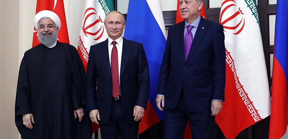 تركيا وإيران يتعهدان استمرار تحالفهما مع روسيا حول سوريا