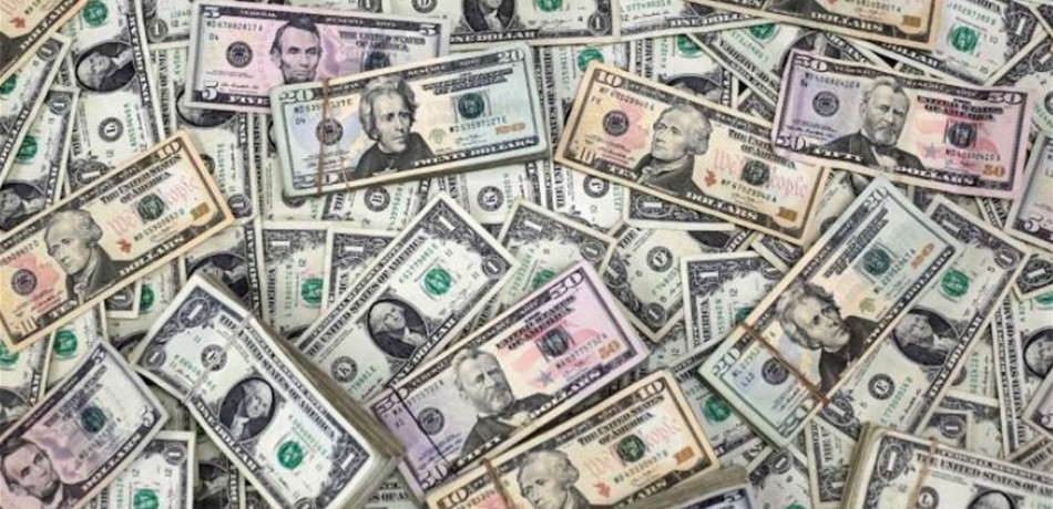الدولار يعزز مكاسبه قبيل إعلان بيان المركزي الأميركي 
