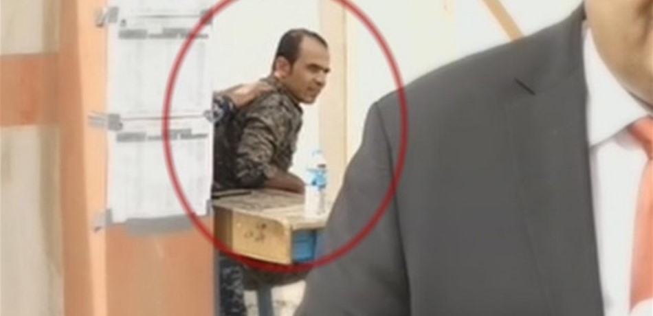 بالفيديو: مساج "أمني" أثناء التصويت في انتخابات العراق!