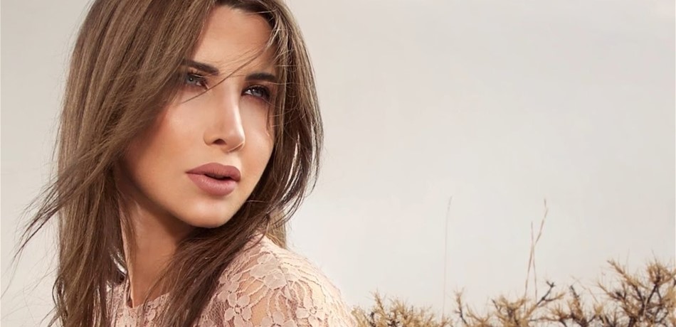 بالصورة: زوج نانسي يحتفل بعيدها.. وقالب حلوى مميز! 