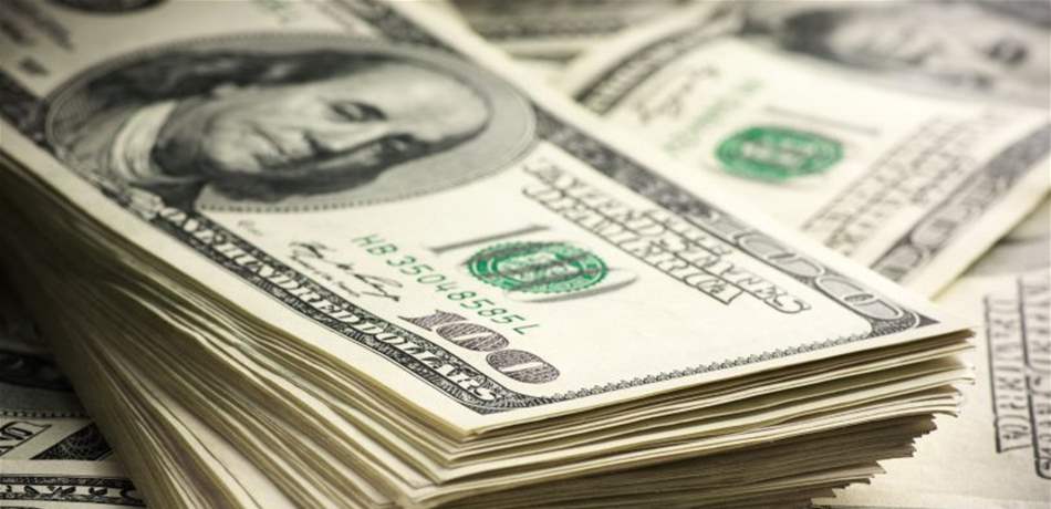 طفل يضع 1000 دولار في آلة تمزيق الورق (فيديو)