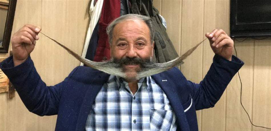 "أصلان" يستعدّ لدخول "غينيس" كصاحب أطول شاربٍ في العالم! (صور) 