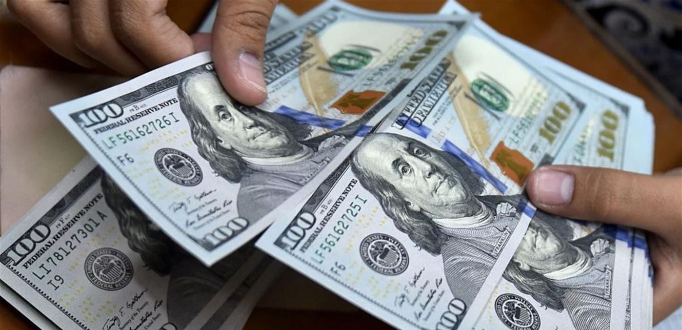 "المعلوماتية" تستدعي صحافياً بسبب تغريدة عن الدولار